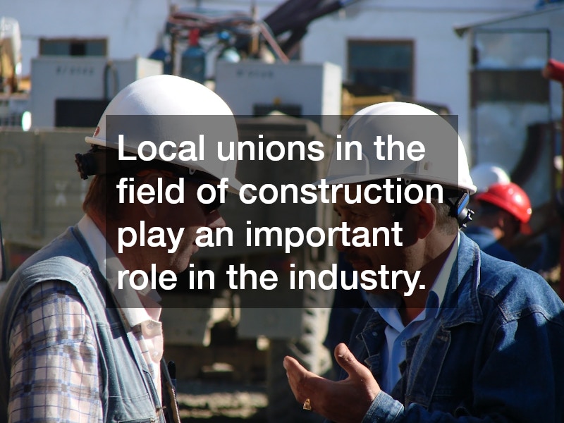 two construction workers having a conversation